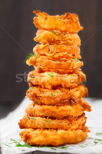 Homemade crunchy fried onion rings Stock photo © vankad