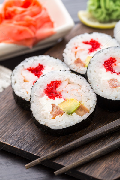 Sushi rolls with tobiko and shrimps Stock photo © vankad