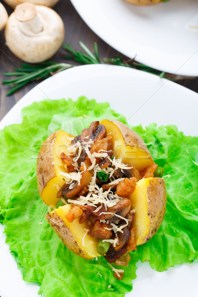 Stock photo: Baked potato with bacon and mushrooms