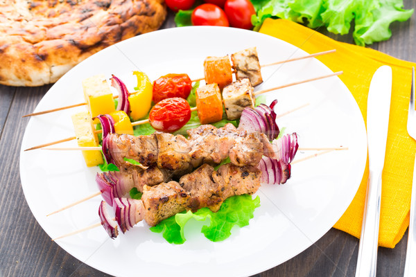 Barbecued pork and vegetable kebabs Stock photo © vankad