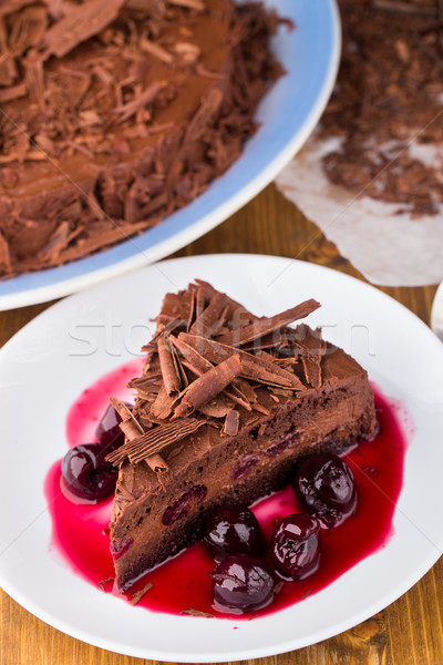 Chocolate mousse cake with dark cherries Stock photo © vankad