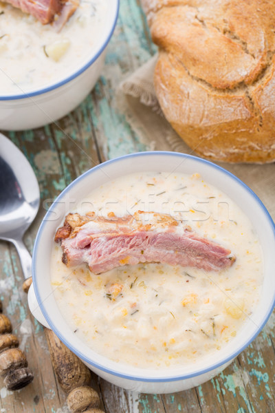 Cheese soup with smoked ribs Stock photo © vankad