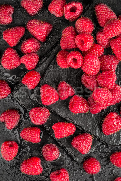 Fresh red raspberries on a slate background Stock photo © vankad