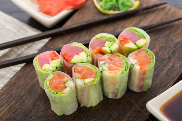 Spring rolls with tuna and salmon Stock photo © vankad