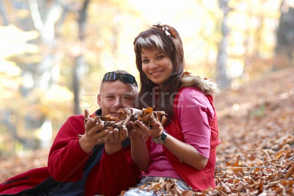 Young couple enjoying the falling leaves Stock photo © vapi