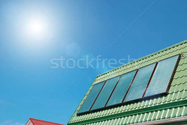 Naprendszer nap víz fűtés égbolt ház Stock fotó © vapi