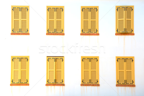 Sok zárva ablakok zsalu fehér fal Stock fotó © vapi
