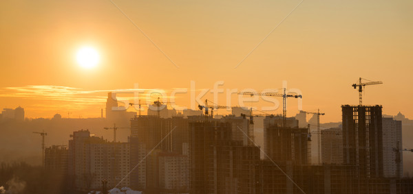 Panorama puesta de sol ciudad silueta edificios industrial Foto stock © vapi