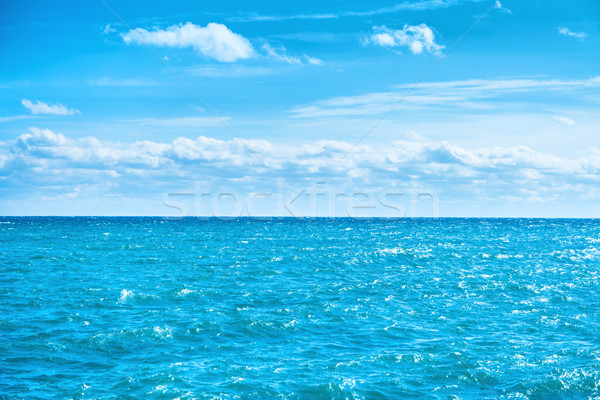 Sea water and blue sky with white clouds Stock photo © vapi