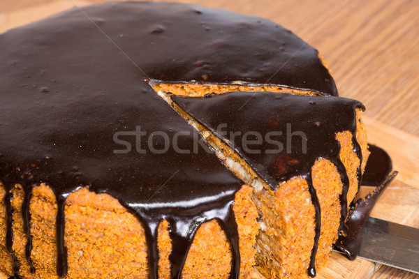 Stock photo: Sliced chocolate birthday cake