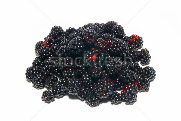 Stock photo: Pile of fresh blackberries isolated on white.