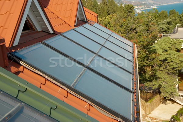 Alternatív energia naprendszer ház tető üzlet Stock fotó © vapi