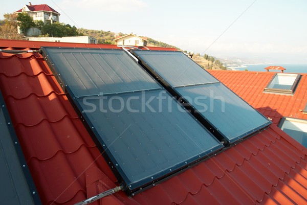 Alternativa energia sistema solar casa telhado negócio Foto stock © vapi