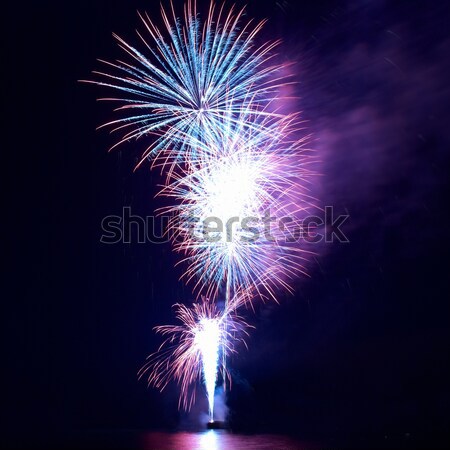 Stockfoto: Rood · kleurrijk · vuurwerk · zwarte · hemel · gelukkig