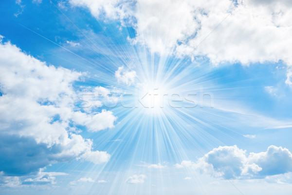 Sun with rays on blue sky Stock photo © vapi