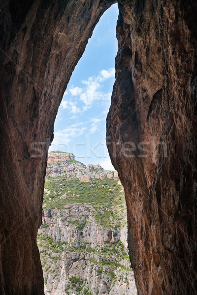Kijárat barlang napos tájkép erdő kék ég Stock fotó © vapi