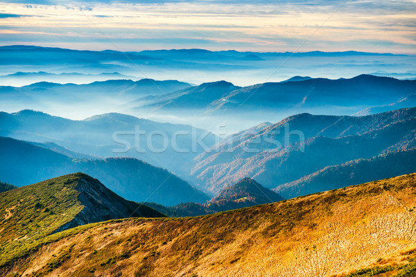 Niebieski góry żółty wzgórza niebo wiosną Zdjęcia stock © vapi