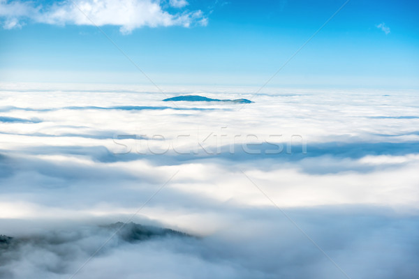 Mountain peak in the clouds Stock photo © vapi