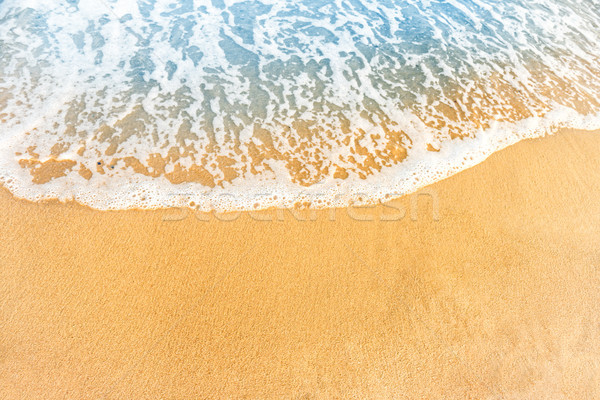 Beach sand and ocean wave Stock photo © vapi