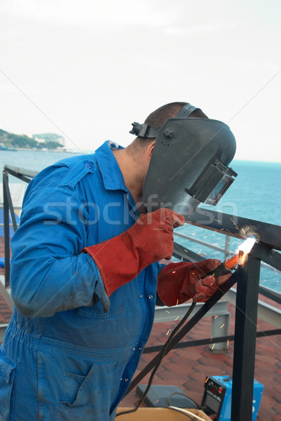 Welder working with metal construction Stock photo © vapi