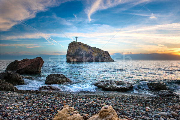 Gün batımı plaj deniz kayalar dramatik gökyüzü Stok fotoğraf © vapi