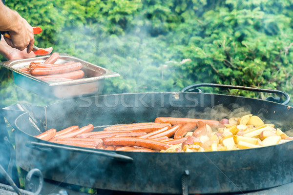 Sausages cooking on the grill Stock photo © vapi