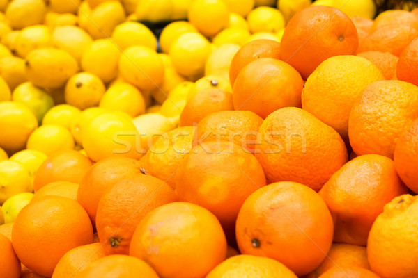 Pile of fresh oranges and lemons Stock photo © vapi