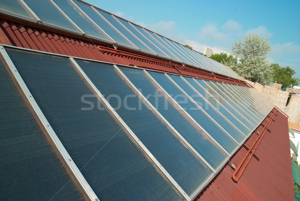 Sistema solar techo solar agua calefacción rojo Foto stock © vapi