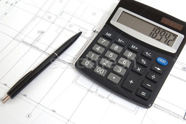 Calculator and pen on a blueprint Stock photo © vapi