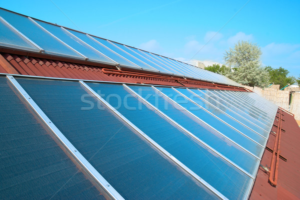 Солнечная система крыши солнечной воды отопления красный Сток-фото © vapi