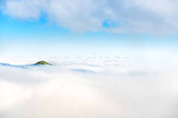 Mountain peak in the clouds Stock photo © vapi