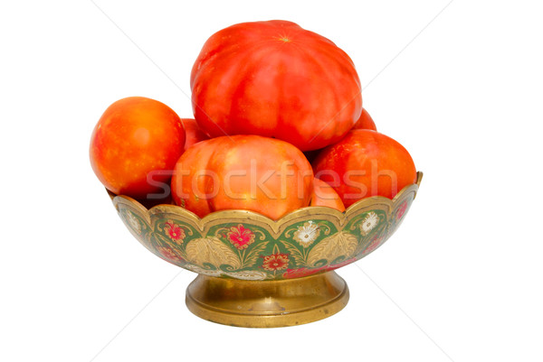 Tomatoes in painted plate isolated on white. Stock photo © vapi