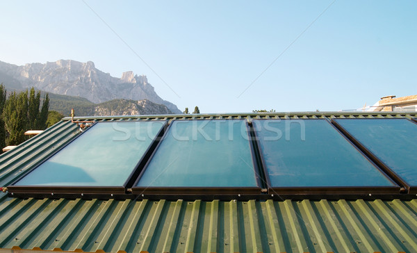 Solar panels (geliosystem) on the house roof. Stock photo © vapi