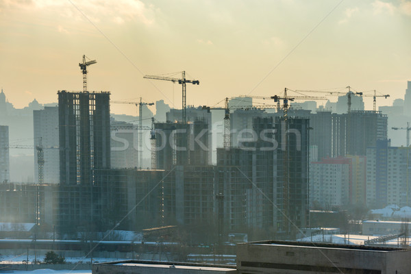 Constraction site with industrial cranes Stock photo © vapi