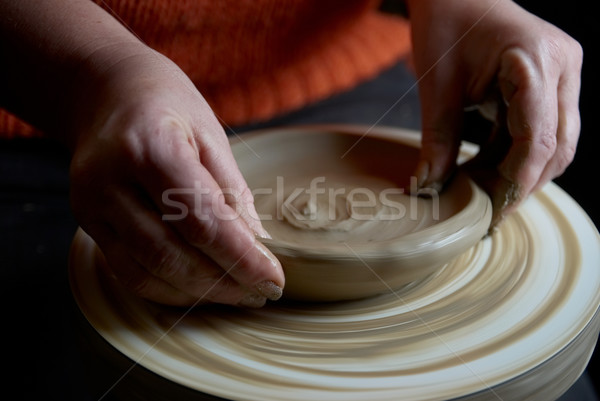 Hands forming clay pot Stock photo © vapi