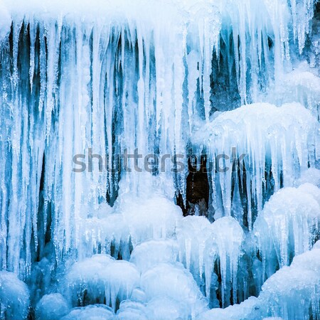 Frozen waterfall of blue icicles Stock photo © vapi