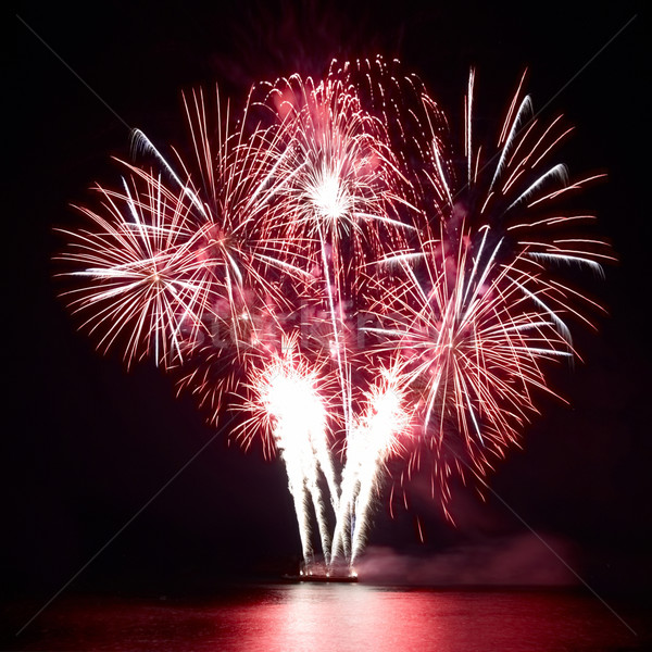 Colorato fuochi d'artificio nero cielo acqua luce Foto d'archivio © vapi