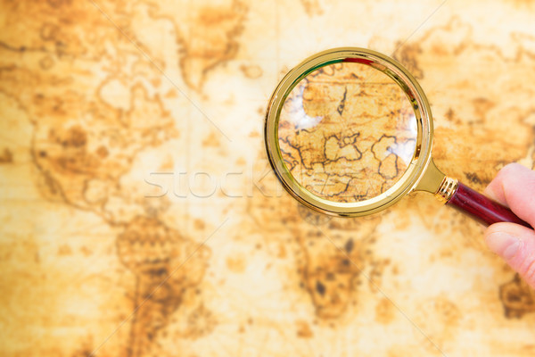 Régi térkép nagyító kéz klasszikus utazás üzlet Stock fotó © vapi