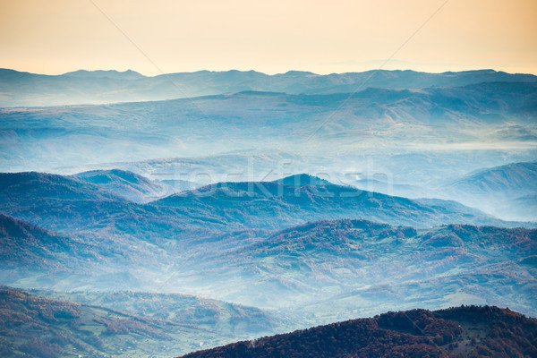 Stock photo: Blue mountains and hills at sunset