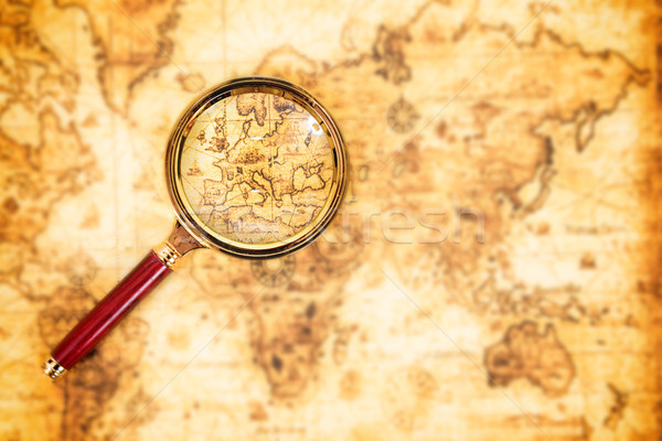 Old map with an magnifying glass Stock photo © vapi