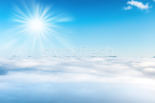 Sun and clouds on the blue sky Stock photo © vapi