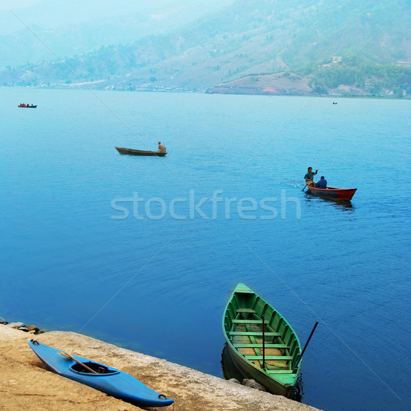 Ahşap tekneler göl Nepal akşam güneş Stok fotoğraf © vapi