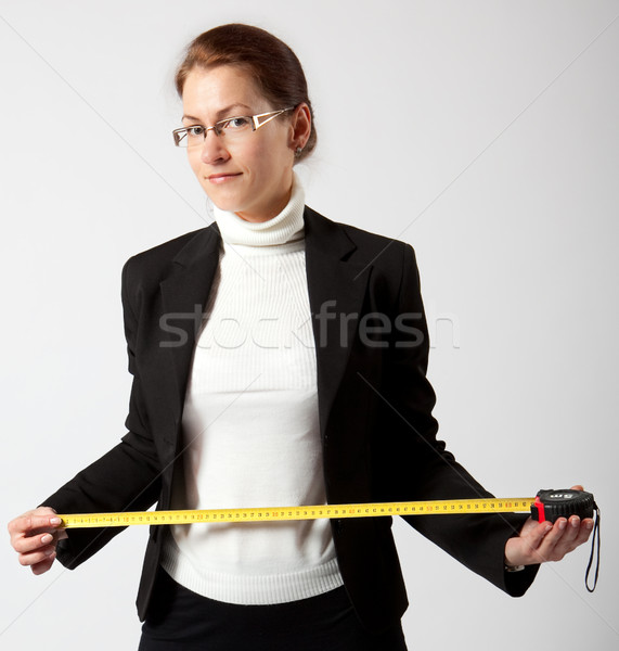 business woman with tape-measure  Stock photo © varlyte