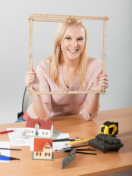 architect woman holding meter frame close to face Stock photo © varlyte