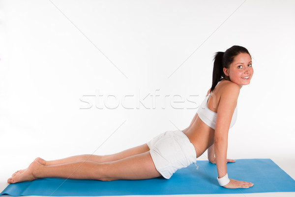 woman doing yoga exercise Stock photo © varlyte