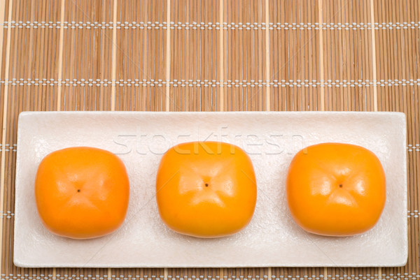 Curmal japonez trei placă portocaliu culoare Imagine de stoc © varts