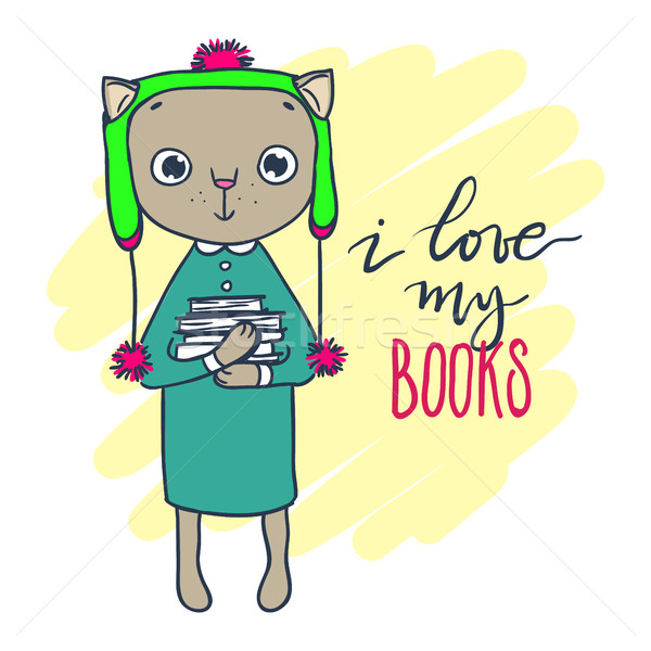 Stock photo: Cute kitty in hat with books. Inscription: I love my books