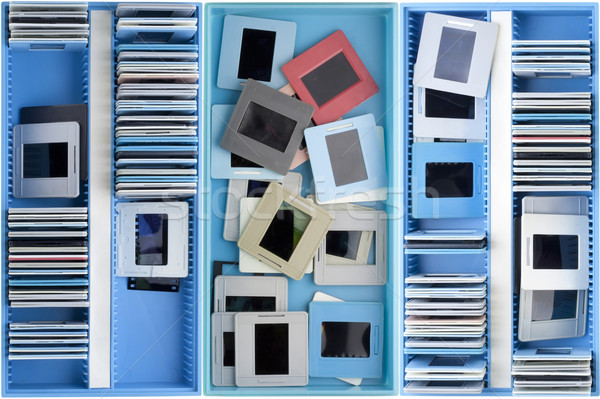 Stock photo: Boxes with old dusty slides
