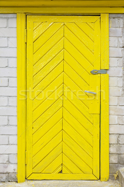 Yellow old wooden door Stock photo © vavlt