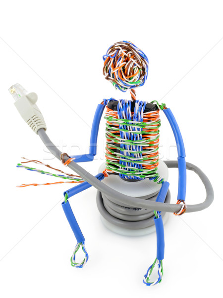 Twisted man from a computer cable Stock photo © vavlt